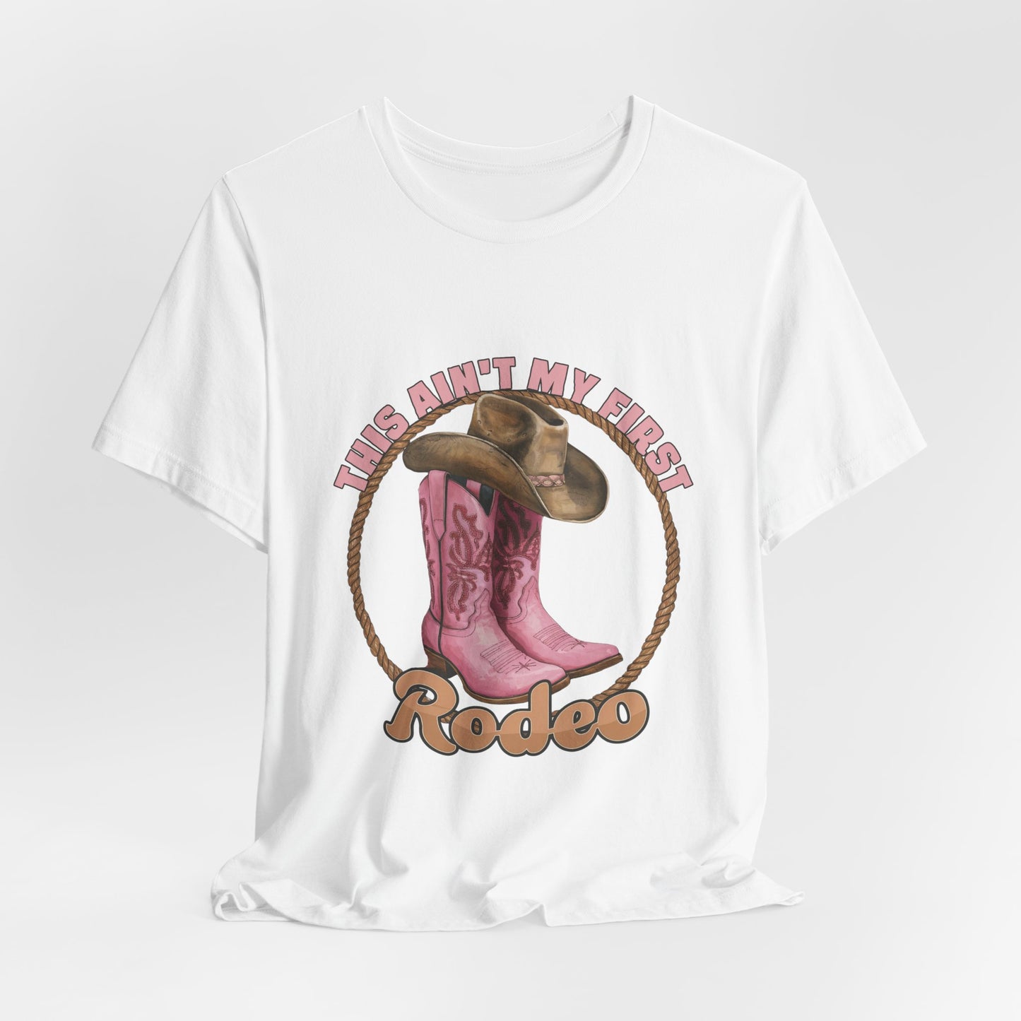 Rodeo Tee — "This Ain't My First Rodeo" Pink Boots & Cowboy Hat Graphic